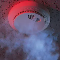smoke-reaching-smoke-alarm-on-ceiling.jpg